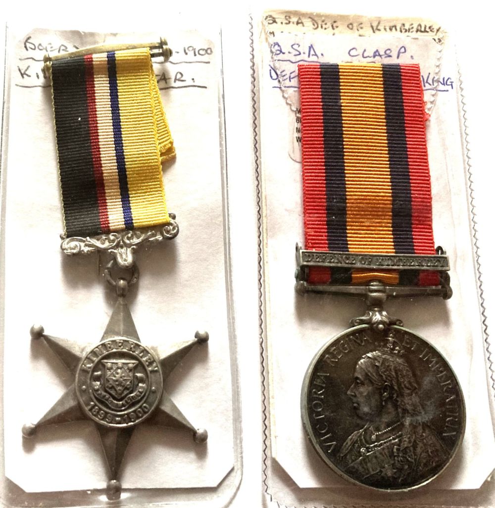 Lot 238: Pair of medals. Kimberley star A 1900 with...