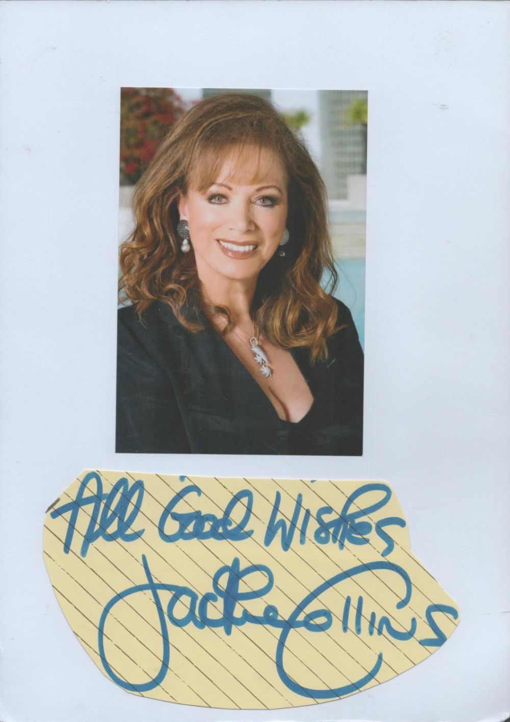 Lot 224: Jackie Collins irregular cut signature piece, stuck below...