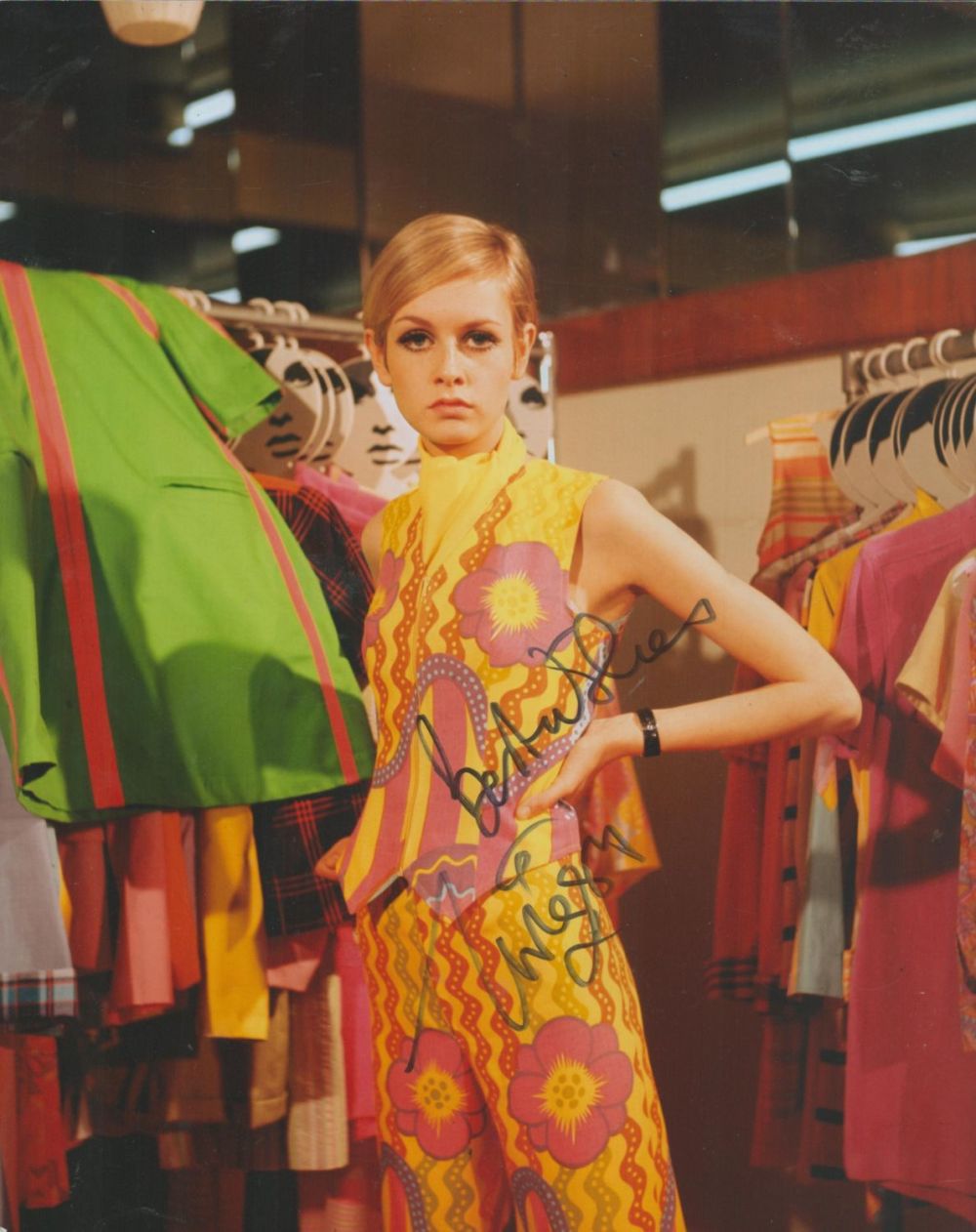 Lot 228: Twiggy signed 10x8inch colour photo. 60's image. Good...
