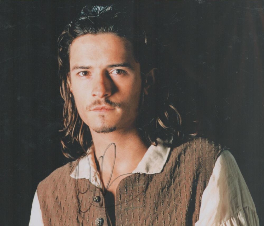 Lot 261: Orlando Bloom signed 10x8inch colour photo. Good condition....