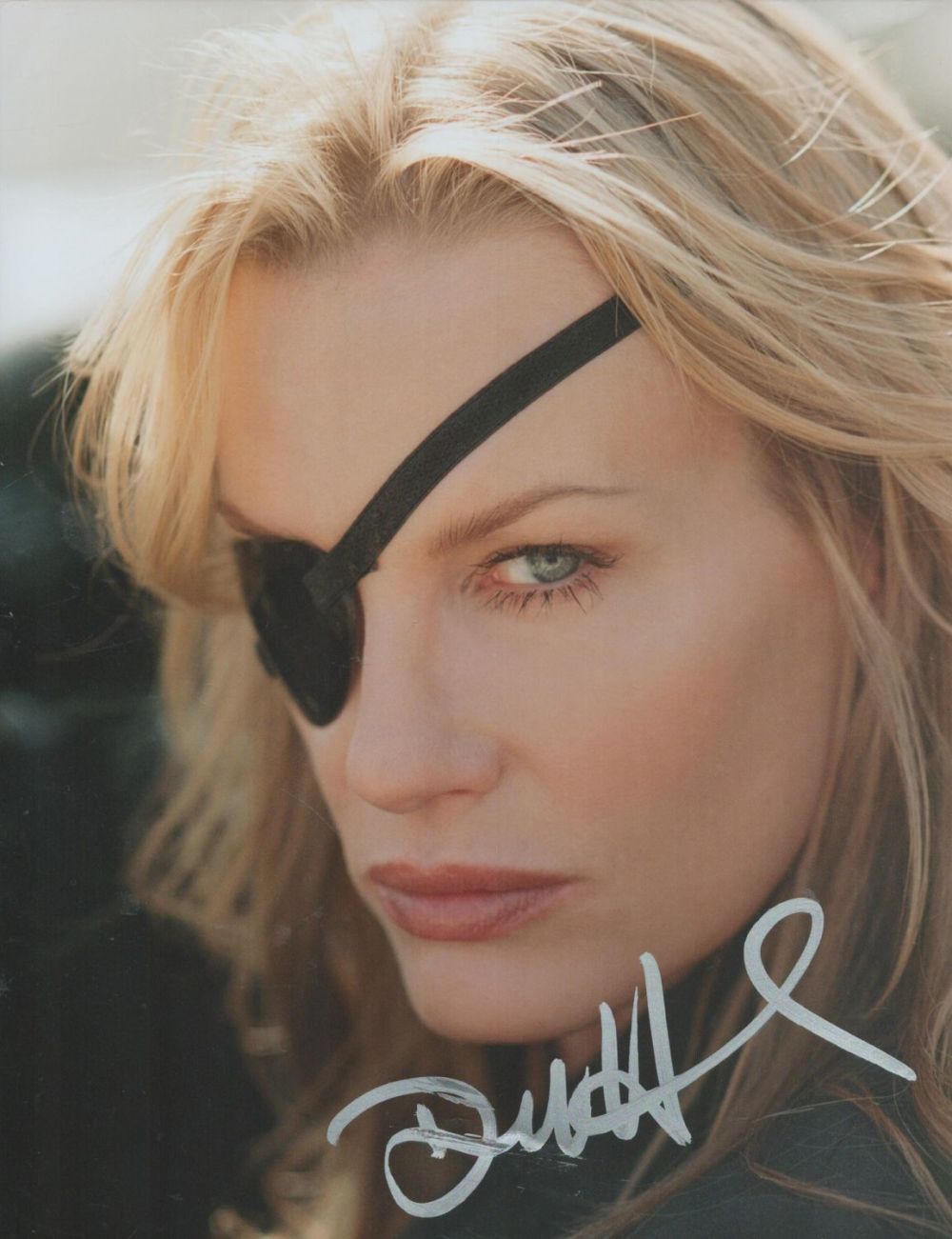 Lot 262: Daryl Hannah signed 10x8inch colour photo. Good condition....