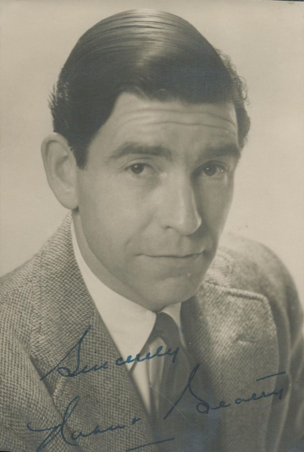Lot 337: Robert Beatty signed vintage black and white photo....