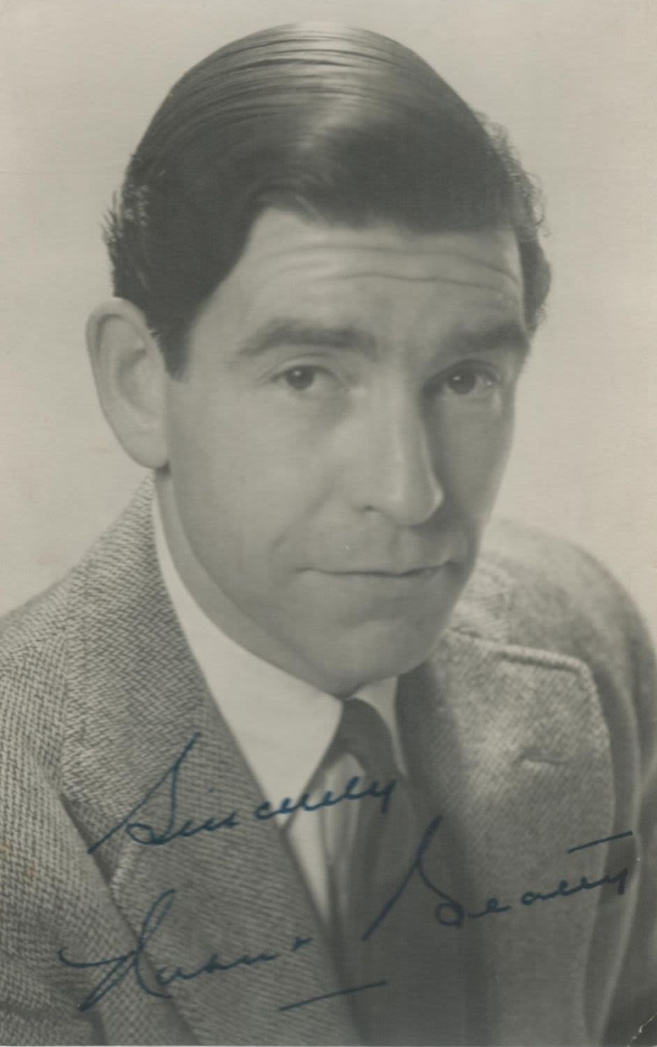 Lot 369: Robert Beatty signed vintage black and white photo....