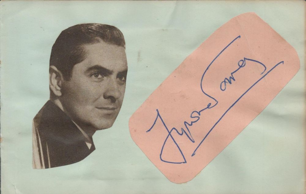 Lot 389: Tyrone Power signed autograph cut outs include newspaper...