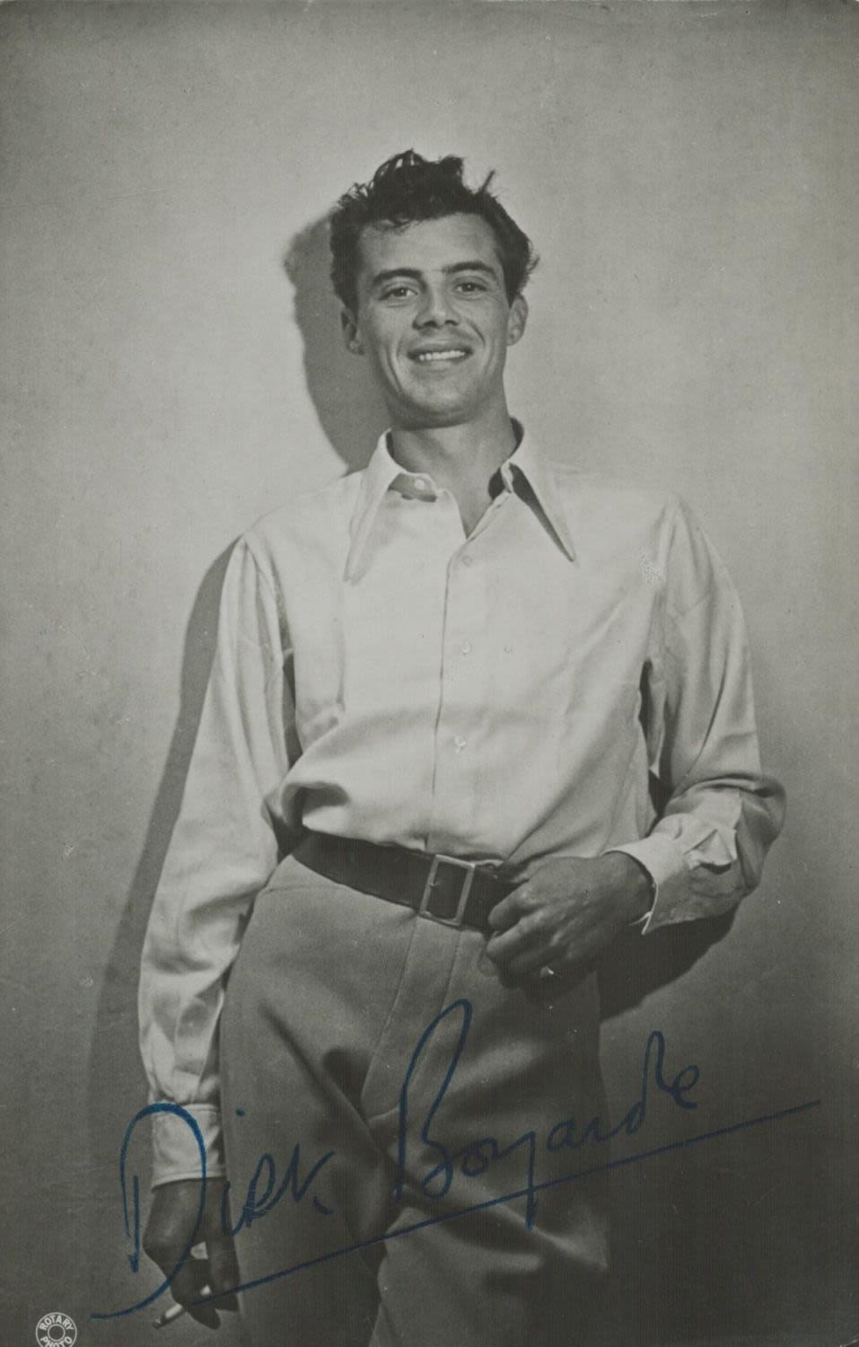 Lot 393: Dirk Bogarde signed black and white photo Approx....