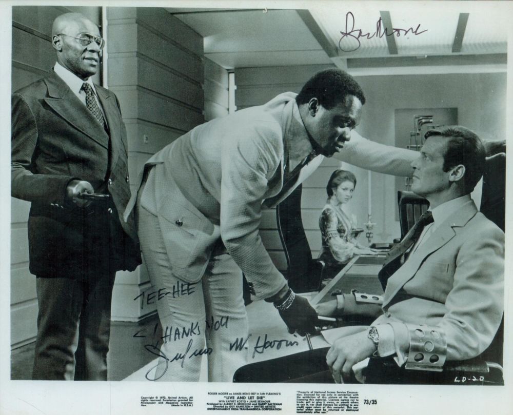 Lot 212: Roger Moore and Julius Harris signed 10x8inch black...
