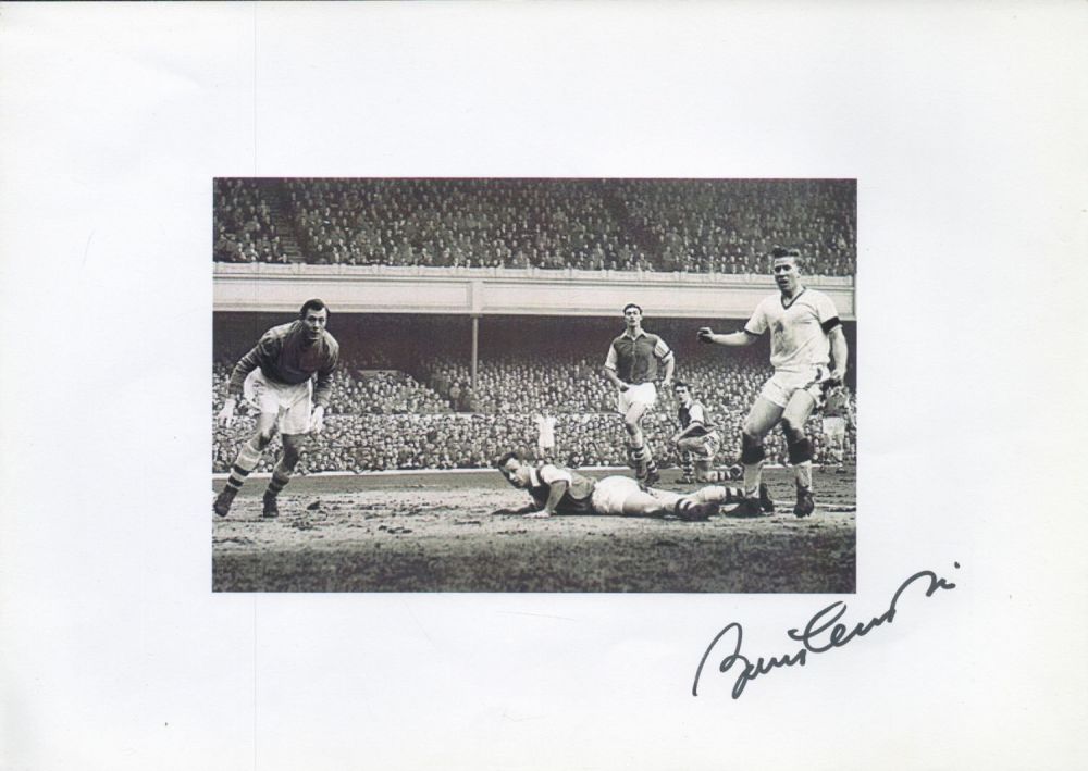 Lot 259: Bobby Charlton signed A4 black and white photo....