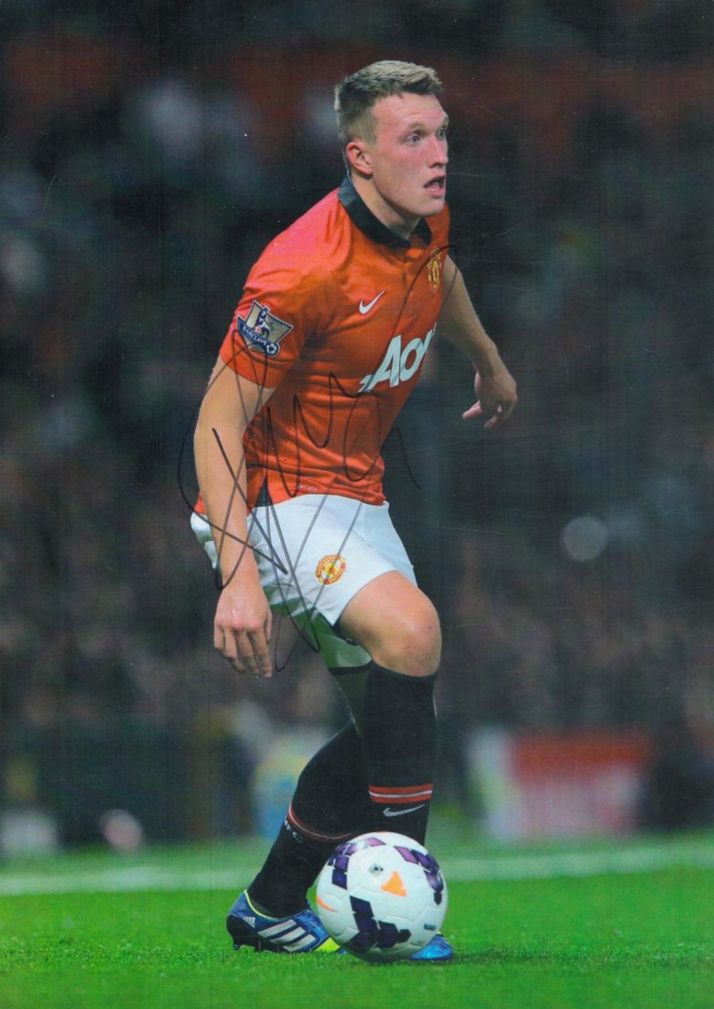 Lot 340: PHIL JONES signed Manchester United 8x12 Photo. Good...