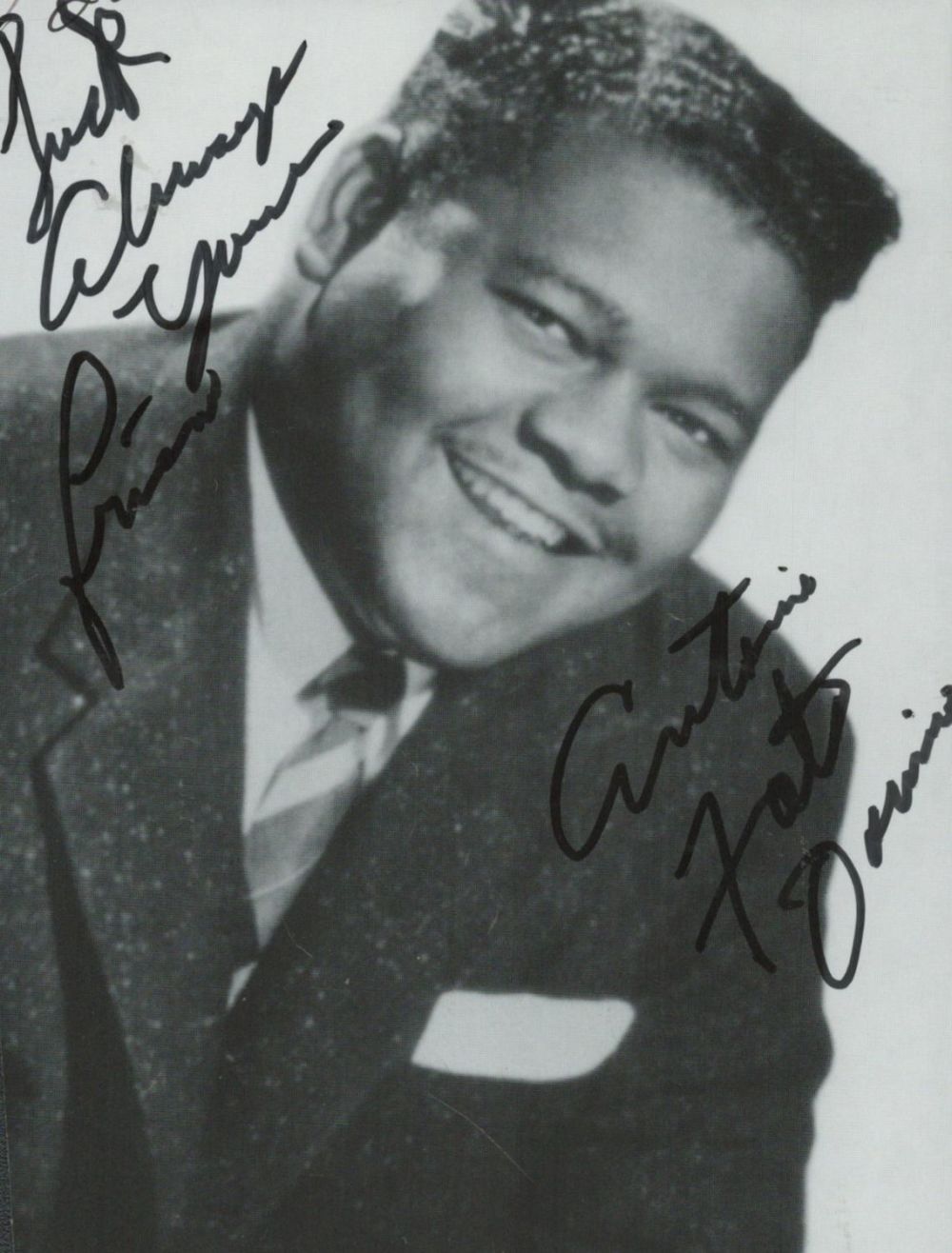 Lot 137: Fats Domino signed 6x5 inch black and white...