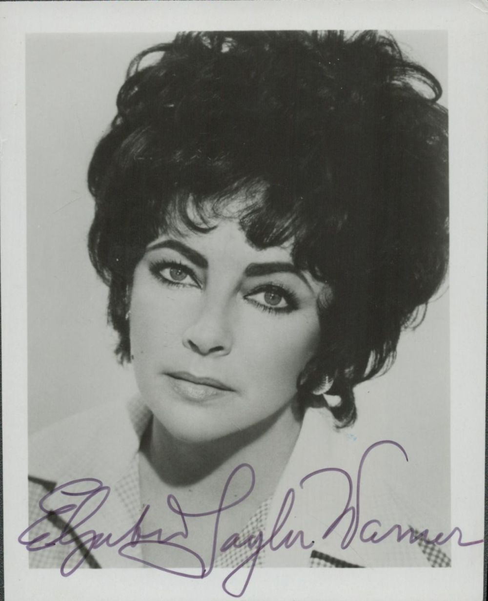 Lot 199: Elizabeth Taylor signed 5x4 inch black and white...