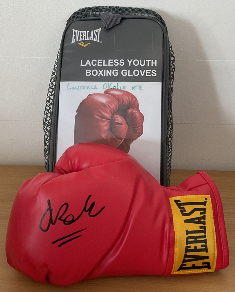 Lot 202: Boxing Lawrence Okolie signed Lonsdale boxing glove. Lawrence...