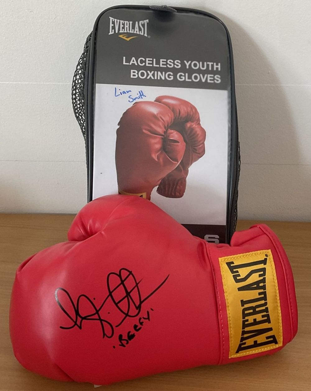 Lot 203: Boxing Liam Smith signed Lonsdale red boxing glove....