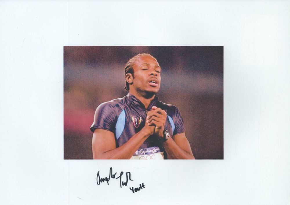 Lot 304: Athletics Angelo Taylor signed 12x8 inch colour photo....