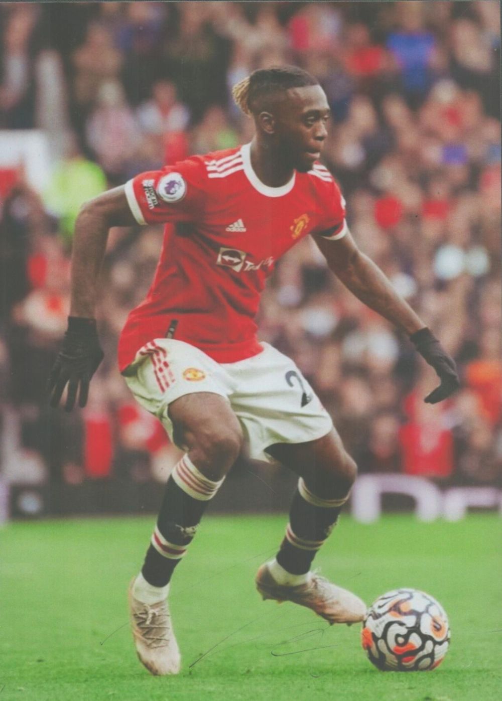 Lot 134: Aaron Wan Bissaka signed 12x8 colour photo. Good...