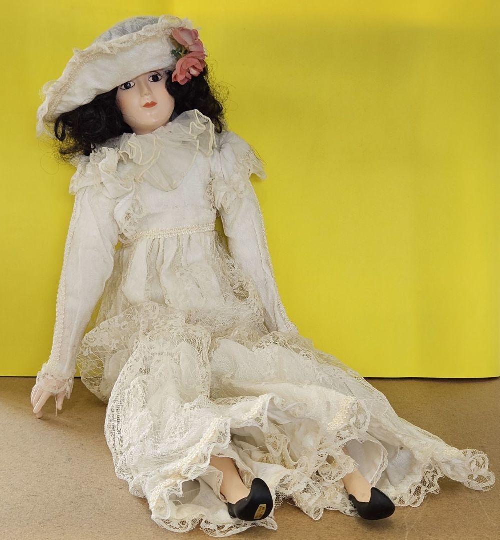 Lot 220: Vintage Porcelain Doll stuffed body Porcelain Head Arms...