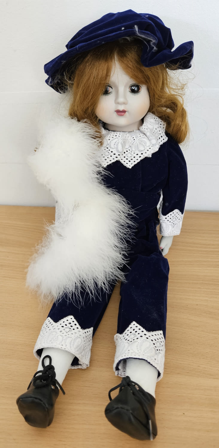 Lot 236: Vintage Porcelain Doll 18 Inch Tall, stuffed body...