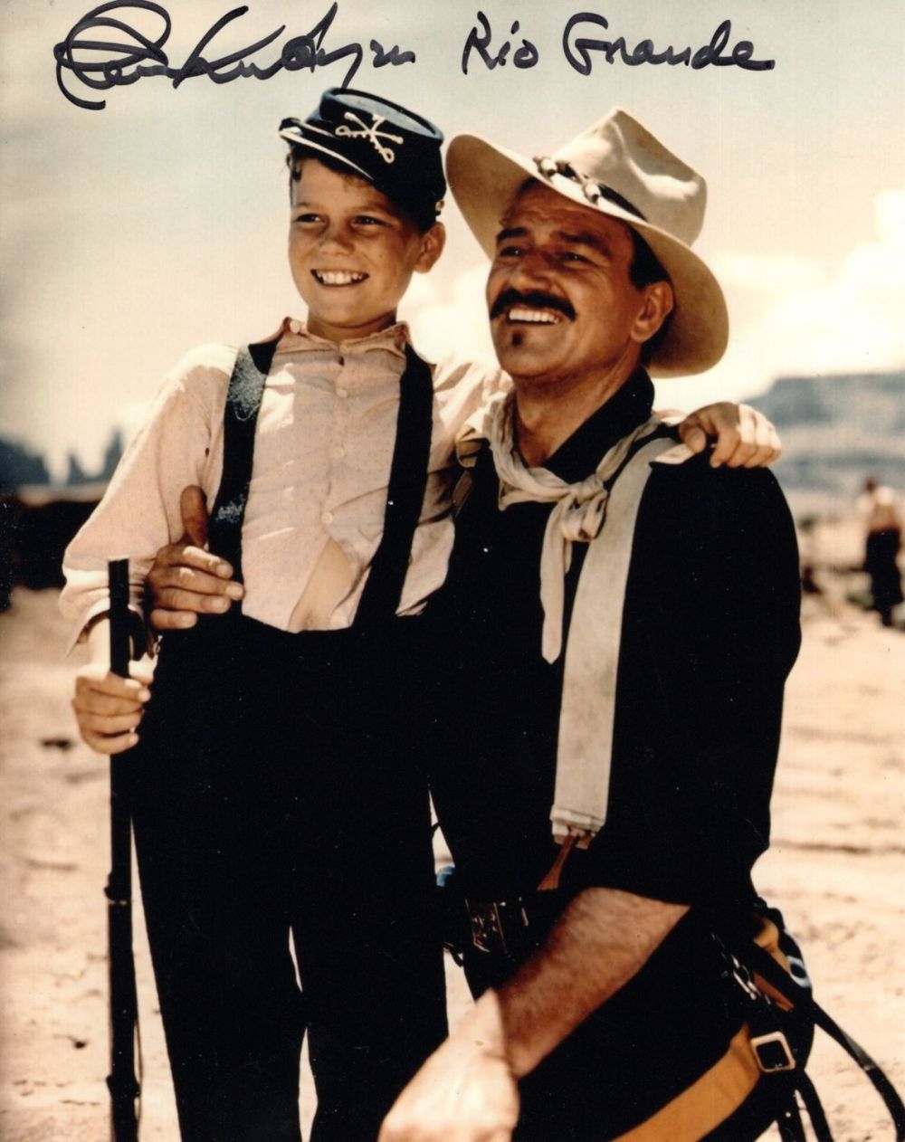 Lot 316: John Wayne western 'Rio Grande' 8x10 inch candid...