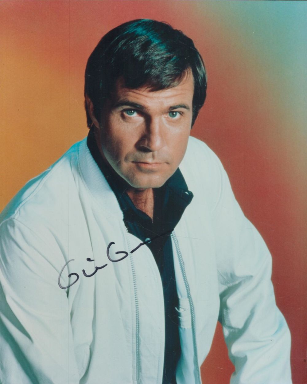 Lot 269: Gil Gerard signed 10x8 inch colour photo. Good...