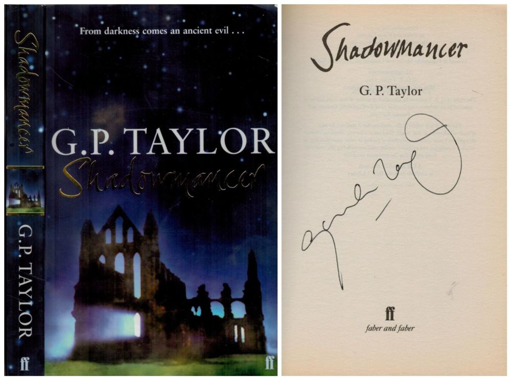 Lot 201: G. P. Taylor Signed Shadowmancer-From darkness comes an...