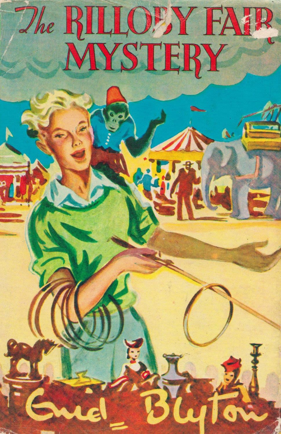 Lot 293: The Rilloby Fair mystery hardback book. Slight rips...