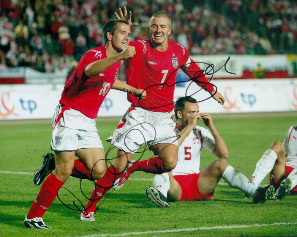 Lot 100: Michael Owen and David Beckham signed 10x8 inch...