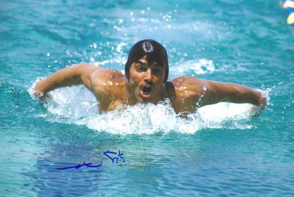 Lot 155: Mark Spitz signed 12x8inch colour photo. Good condition....