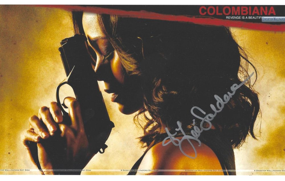 Lot 165: Zoe Saldana signed 12x8inch colour photo. Good condition....
