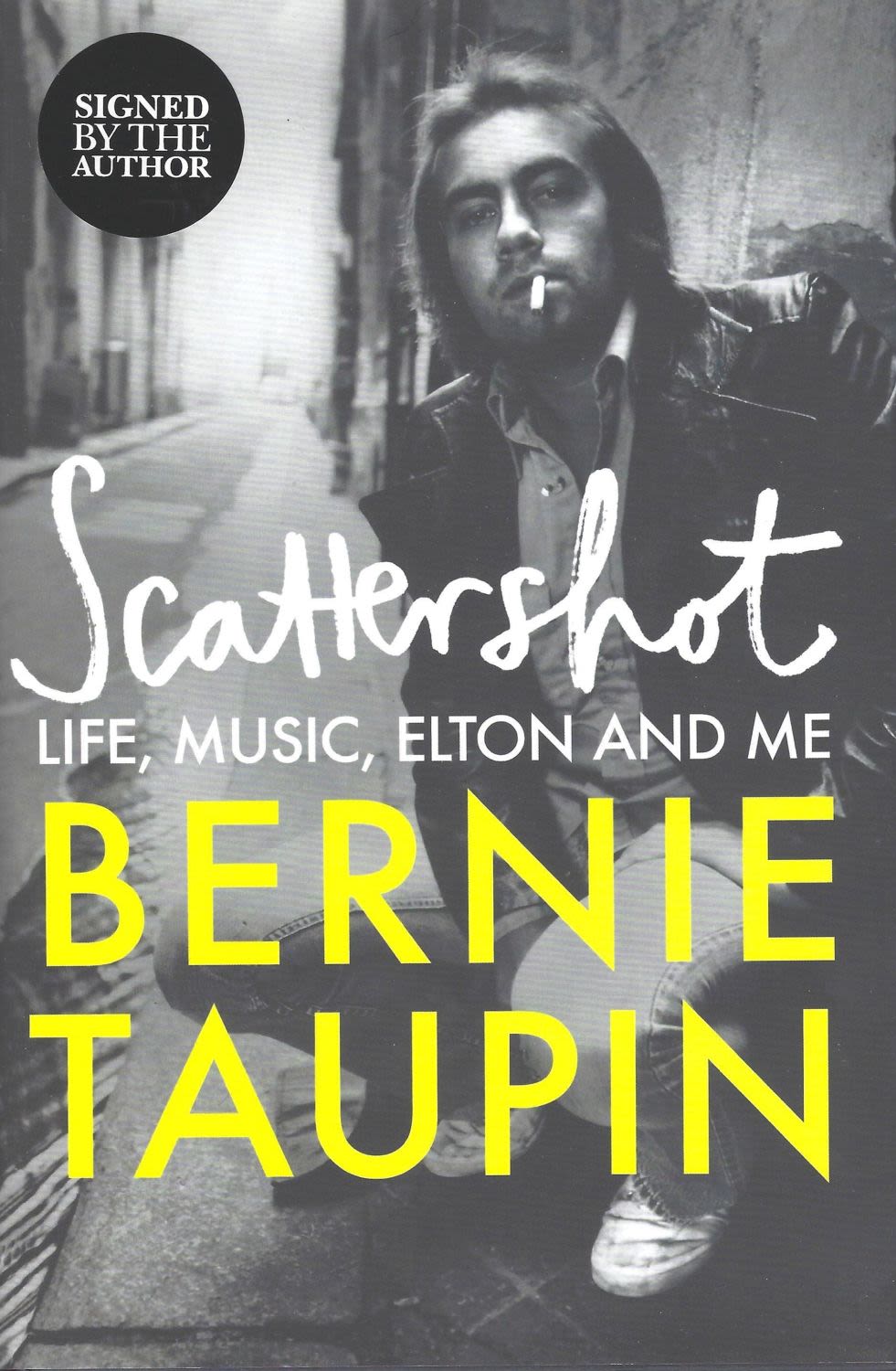 Lot 225: Bernie Taupin signed Scattershot hardback book. Good condition....