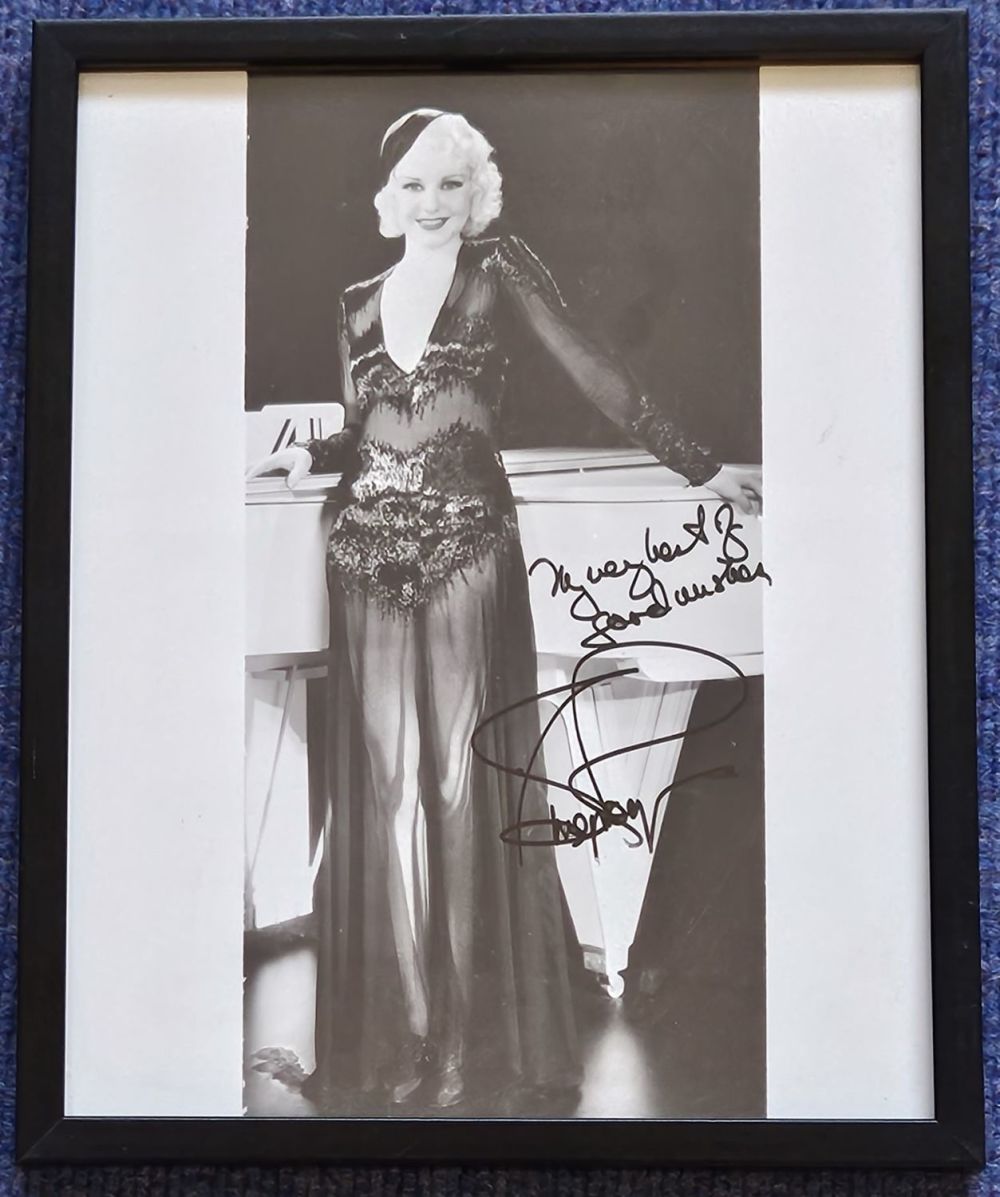 Lot 265: Ginger Rogers signed black and white photo. Framed...
