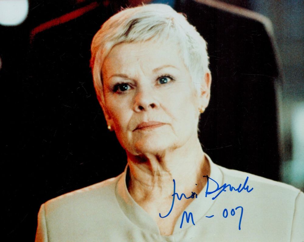 Lot 283: Judi Dench signed 10x8inch colour photo. Good condition....