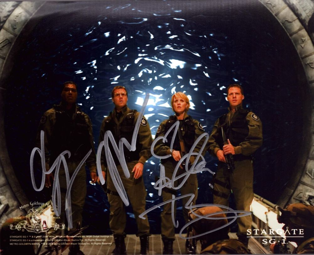 Lot 60: Amanda Tapping, Chris Judge and Michael Shanks signed...