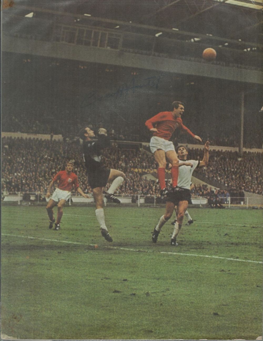 Lot 211: Geoff Hurst signed large colour magazine picture showing...