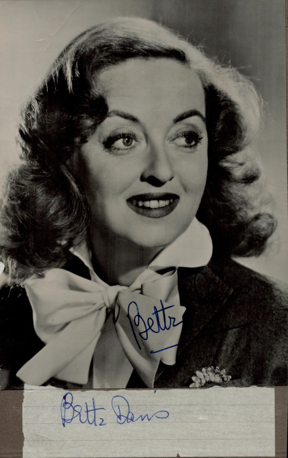 Lot 683: Bette Davis signed 8x6inch black and white photo....