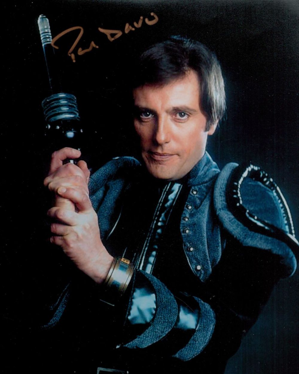 Lot 706: Paul Darrow signed 10x8inch colour photo. Good condition....