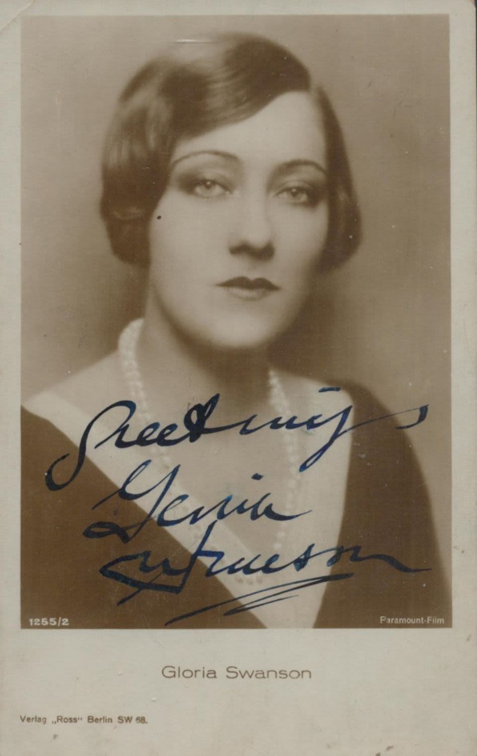 Lot 737: Gloria Swanson signed 6x4inch vintage photo. Good condition....