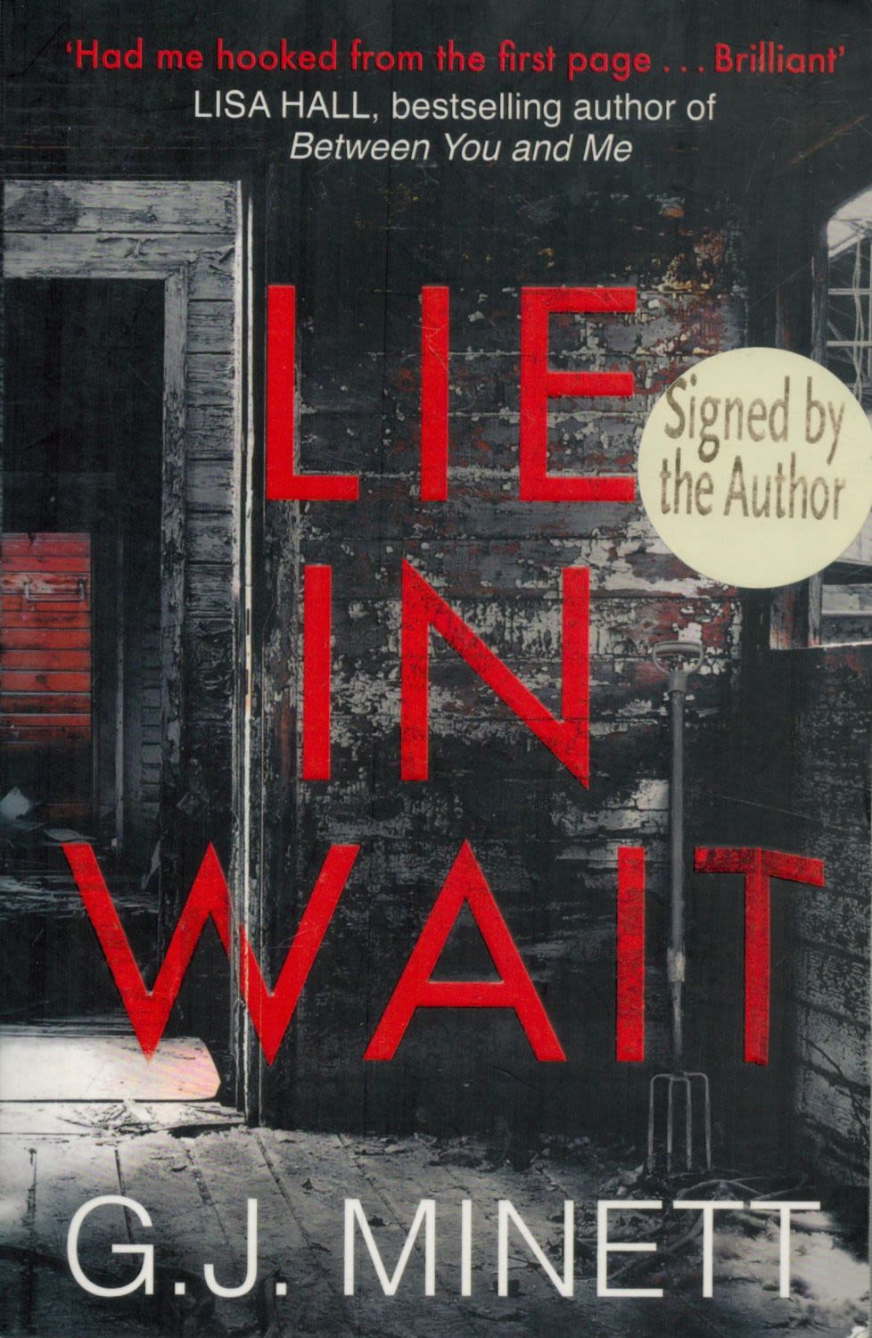 Lot 225: Graham Minett signed Lie in wait paperback book....