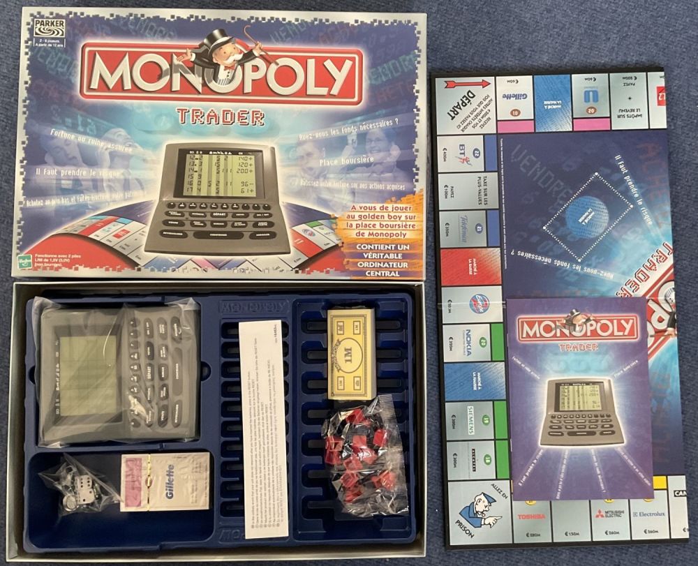 Lot 233: Monopoly Trader by Parker Brothers Hasbro Inc 2001...