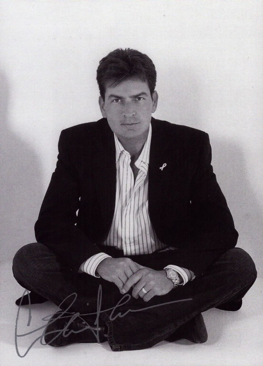 Lot 114: Charlie Sheen signed 7x5 inch black and white...