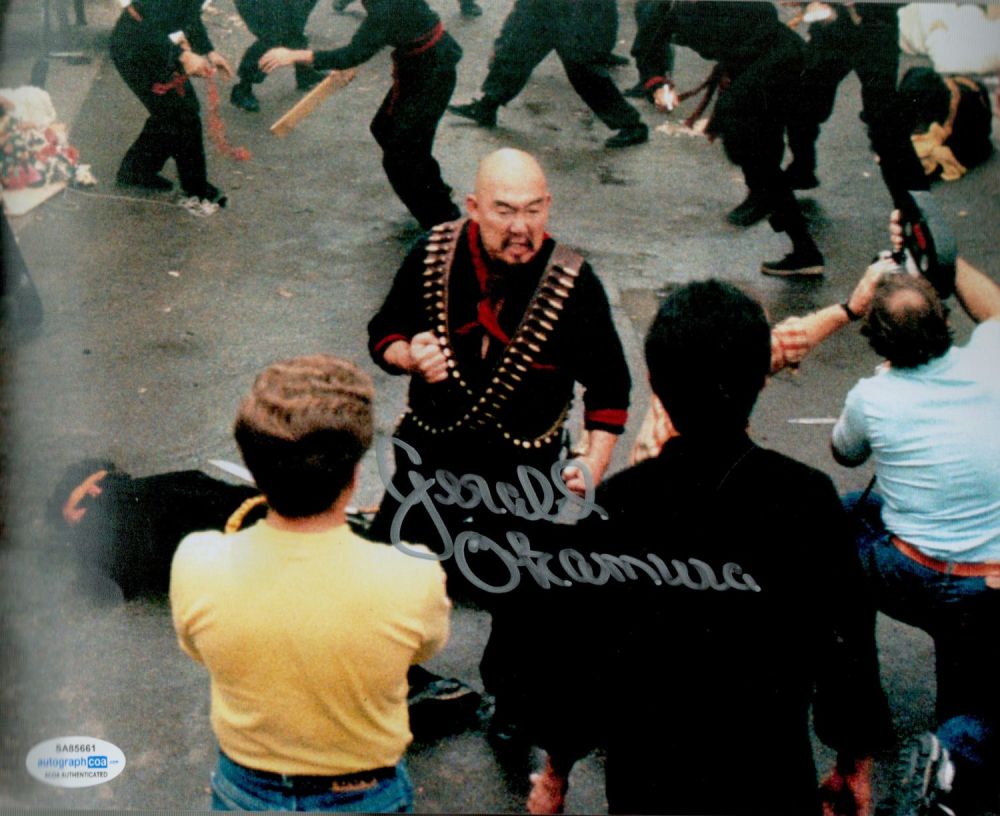 Lot 293: Gerald Okamura signed Colour Photo 10x8 Inch. Is...