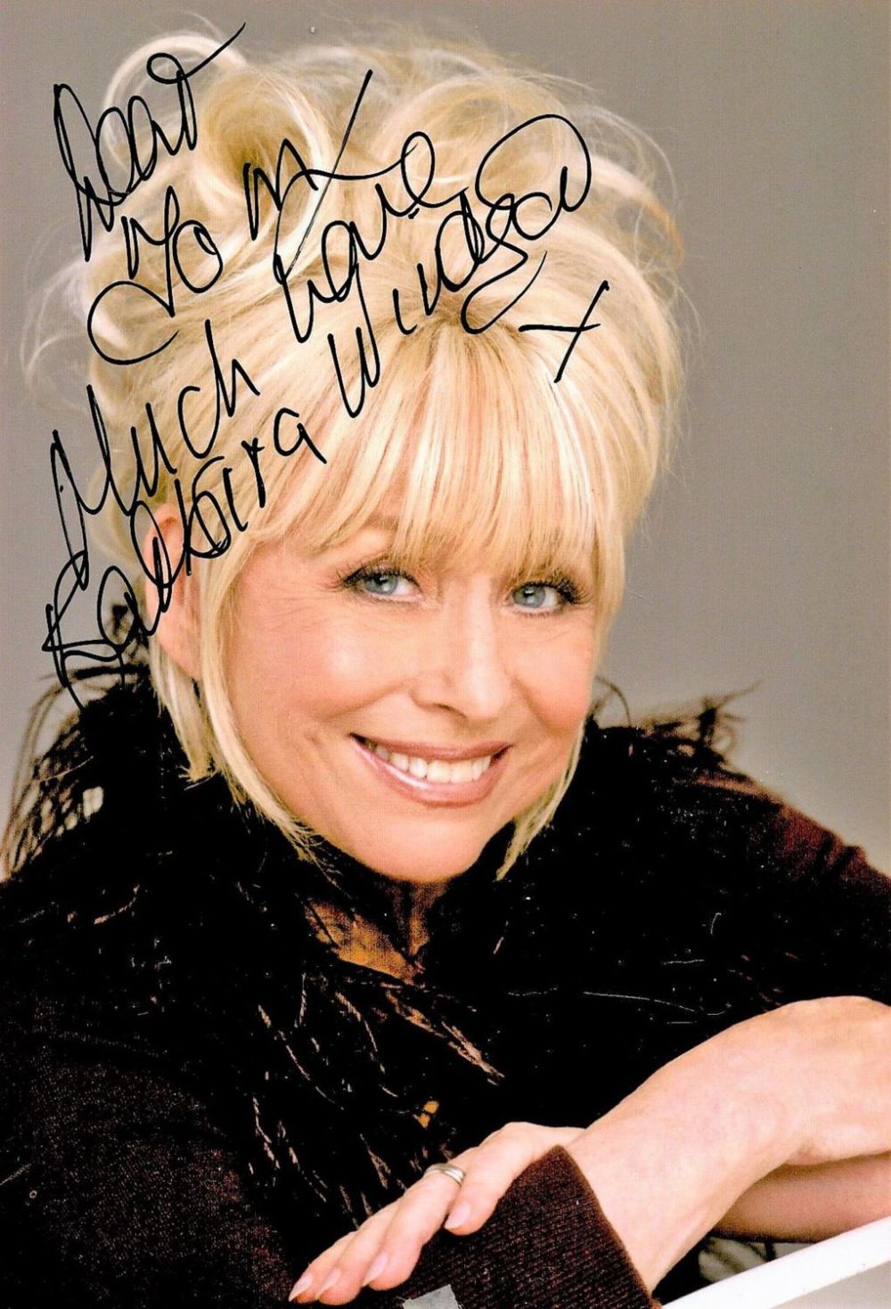Lot 149: Barbara Windsor signed 6x4 colour photo dedicated. Good...