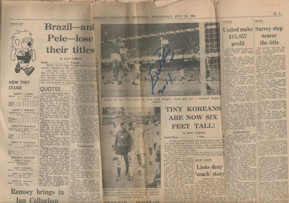 Lot 212: Eusébio signed in blue ink Newspaper page. Four...