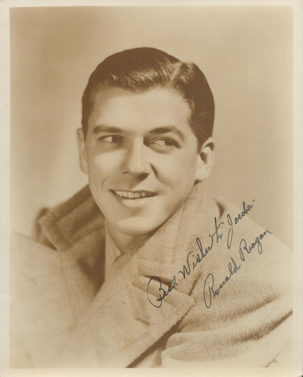 Lot 217: Ronald Reagan signed vintage Black and white photo....