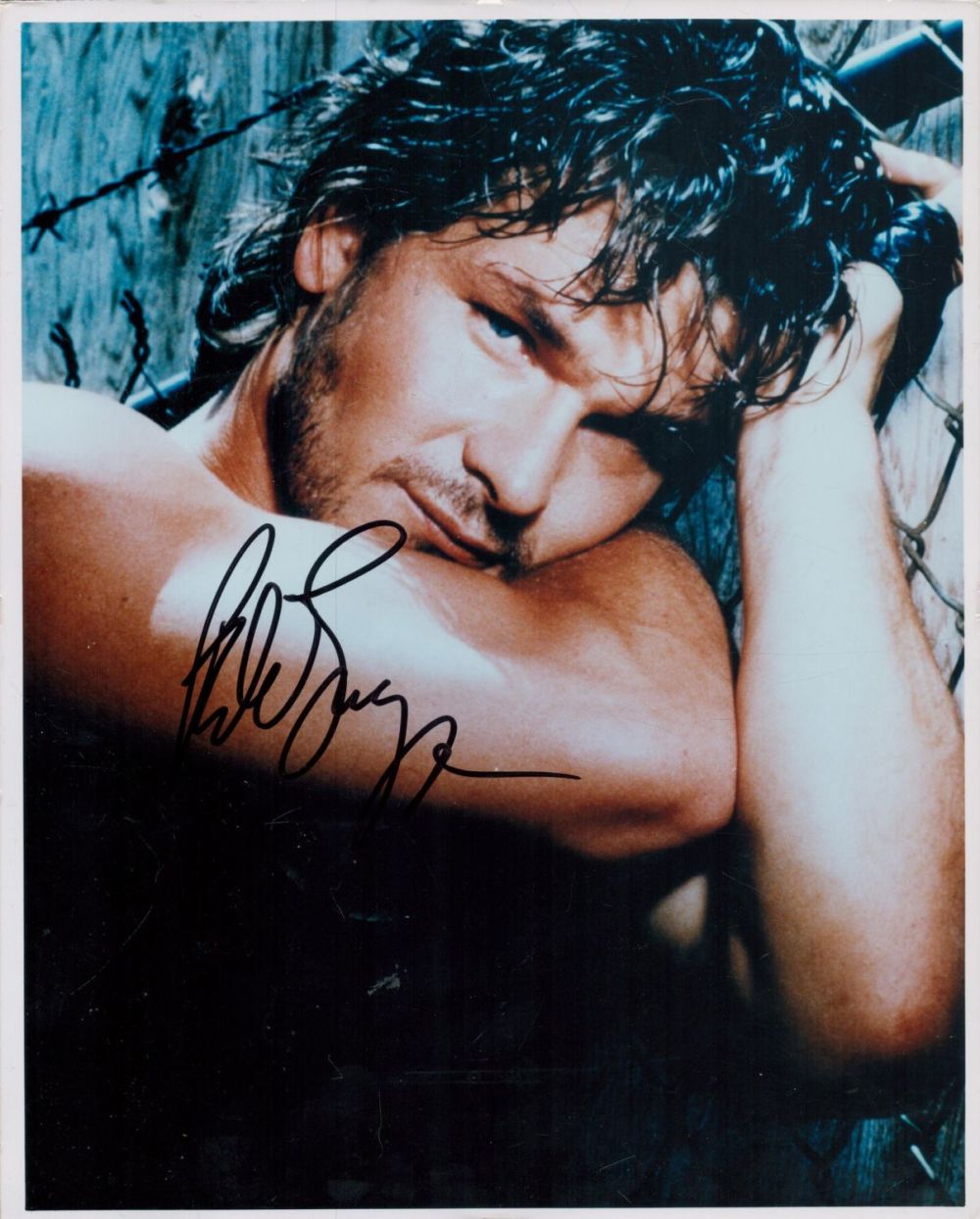 Lot 54: Patrick Swayze signed 10x8 inch colour photo. Good...