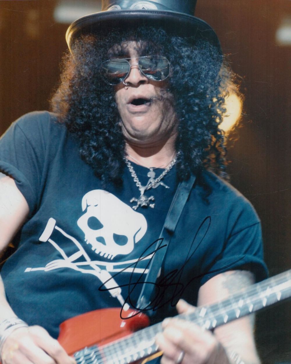 Lot 65: Slash signed 10x8 inch colour photo. Good condition....