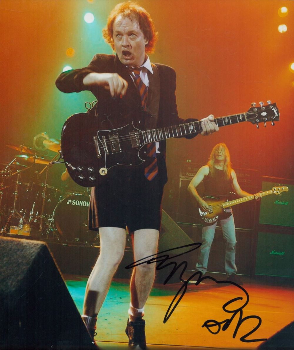 Lot 69: Angus Young signed 10x8 inch colour photo. Good...