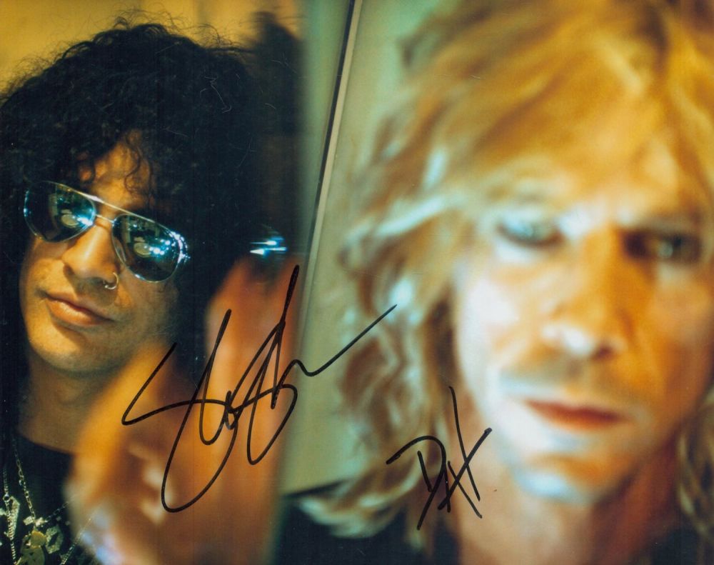 Lot 80: Slash and Duff McKagen signed 10x8 inch Guns...