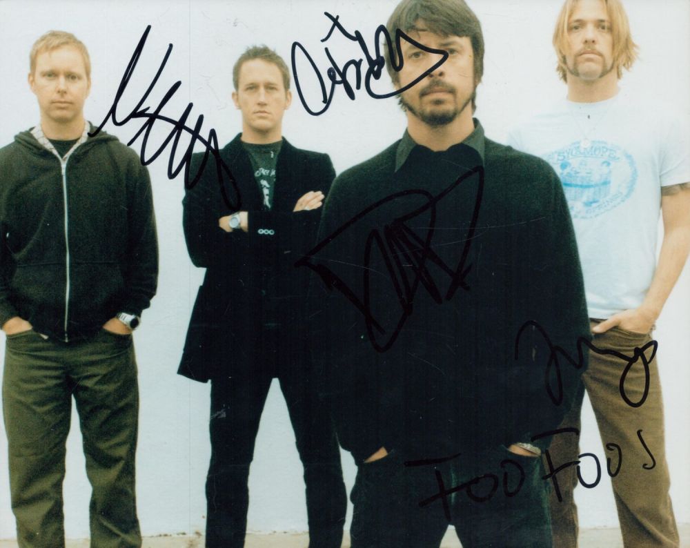 Lot 87: Foo Fighters multi signed 10x8 inch colour photo...
