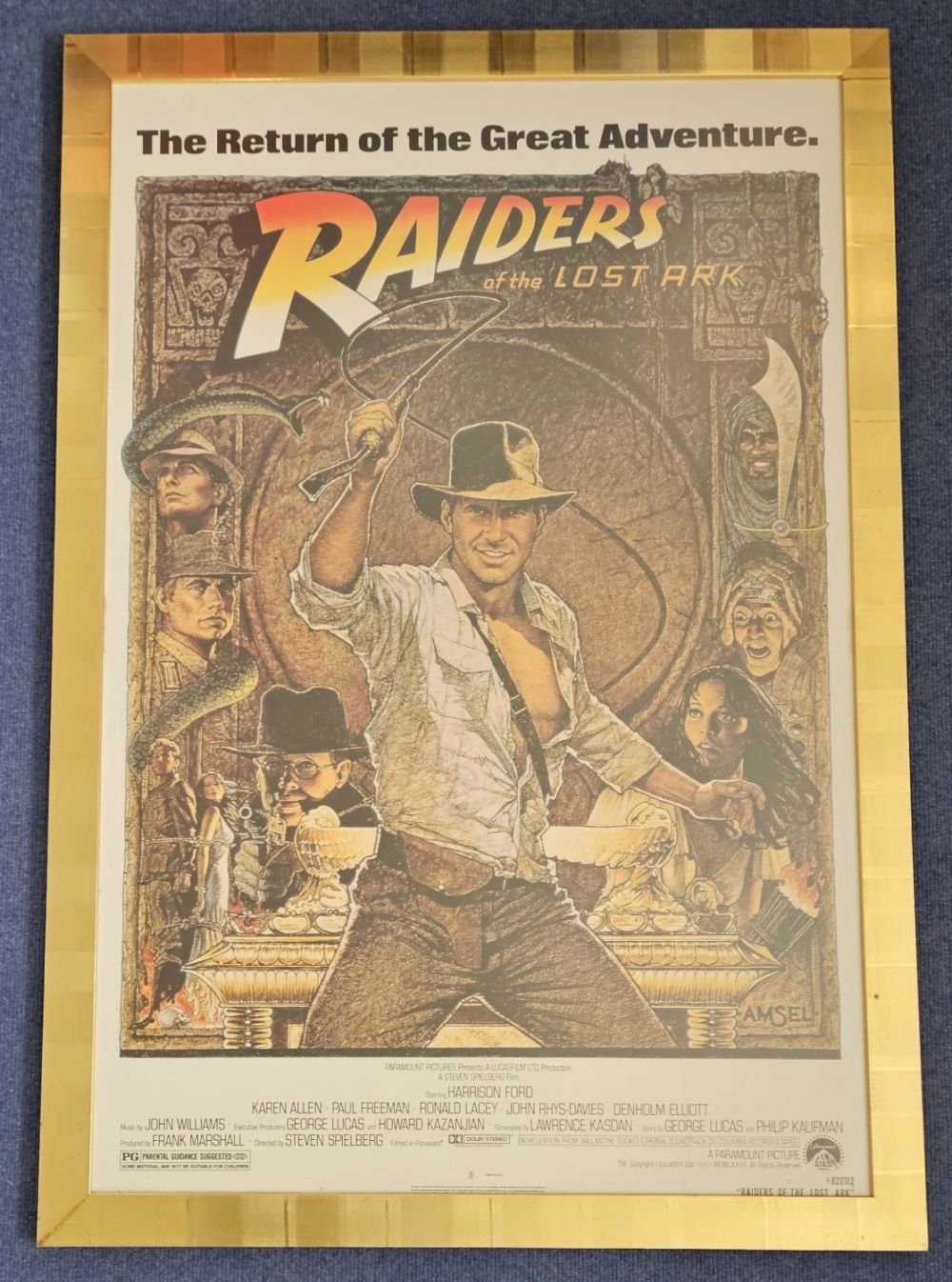 Lot 218: Raiders of the Lost Ark 43x30 inch framed...
