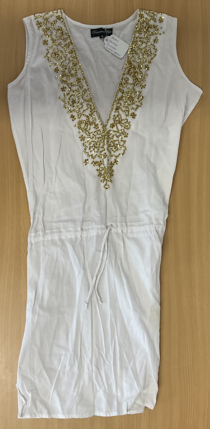 Lot 248: Paris Hilton owned White tunic dress with gold...