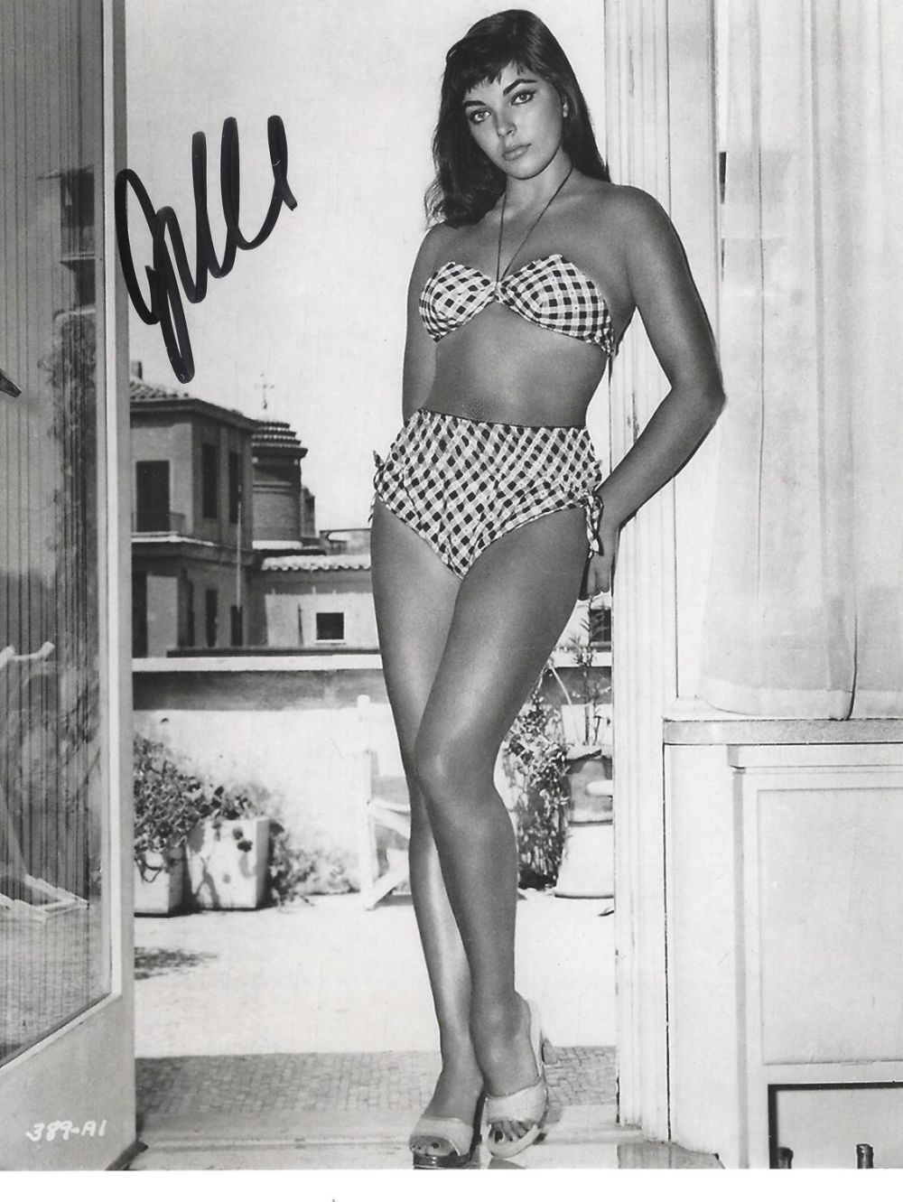 Lot 177: Joan Collins signed 10x8 inch vintage black and...
